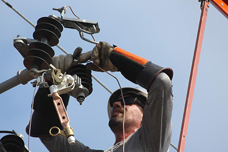 Man working a power line